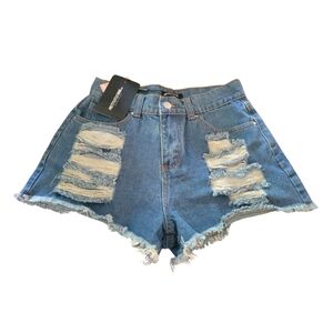 Womens Denim shorts size 4 vintage wash ripped denim elana